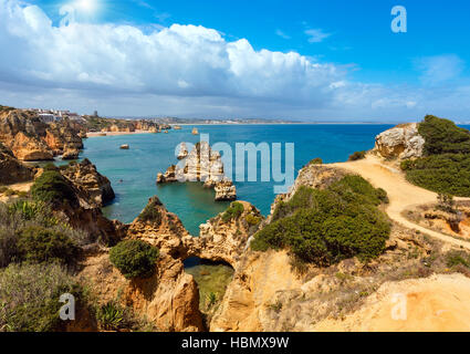 Sunshine above Atlantic rocky coastline (Algarve, Portugal). Stock Photo
