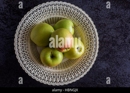 Top view of green apples on a black stone table Stock Photo