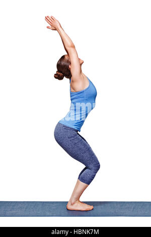 Woman doing first stage of yoga exercise called: Revolved Side Angle Pose,  sanskrit name: Parivrtta Parsvakonasana, isolated on white Stock Photo -  Alamy