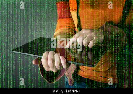 Hacker with graphic user interface around. Computer security concept. Stock Photo