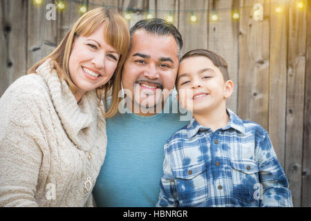 Happy Young Mixed Race Family Portrait Outside. Stock Photo