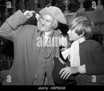 Peter Vaughan (l), who plays Long John Silver, and 16-year-old Michael Newport, as Jim Hawkins, at the BBC Television Centre in London. They are in costume for a new nine-part television serialisation of 'Treasure Island', Robert Louis Stevenson's famous adventure story, set to appear on BBC One. Stock Photo