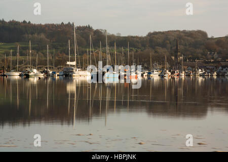 High tide at Kirkcudbright, winter boats reflected in the glass like river Dee looking up to Kirkcudbright and its harbour, Galloway, Scotland, UK Stock Photo