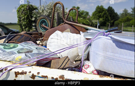 bulk garbage in a dumpster Stock Photo