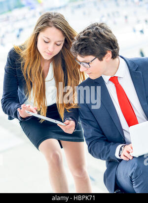 Business people walking outside office Stock Photo - Alamy