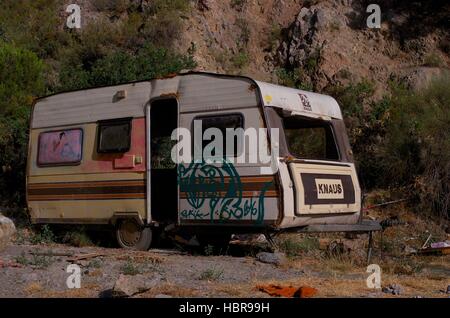 Derelict caravan at Beneficio alternative community, Orgiva, Spain Stock Photo