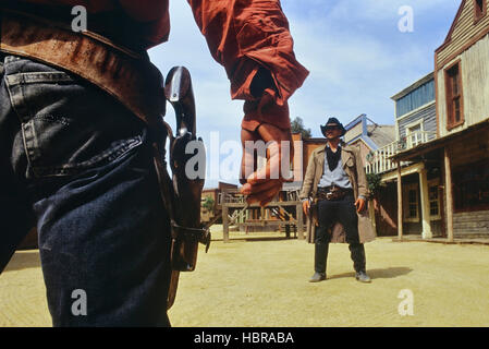 Cowboy pistol duel at Texas Hollywood/Fort Bravo western-styled theme park.  Almeria. Spain Stock Photo