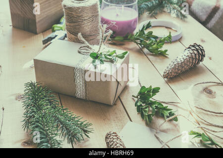 Wrapping eco Christmas packages Stock Photo