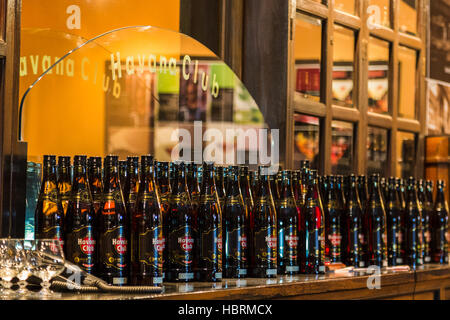 Close-up of bottles of Havana Club rum positioned on a bar in the heart of Havana, Cuba. Stock Photo