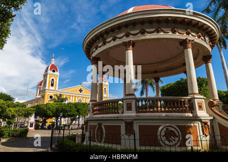 An old bandstand captured in front of 'Our Lady of the Assumption Cathedral' in the main tourist area of Granada. Stock Photo