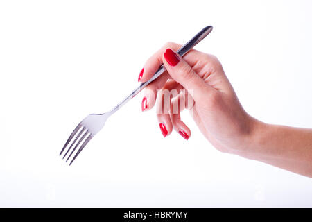 Woman hand holding fork Stock Photo