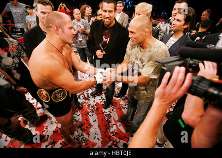 fedor-emelianenko-left-greets-randy-couture-in-the-ring-after-defeating-hbt0je.jpg