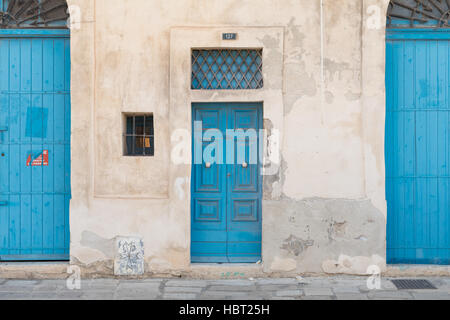 Traditional Maltese doors painted blue Stock Photo