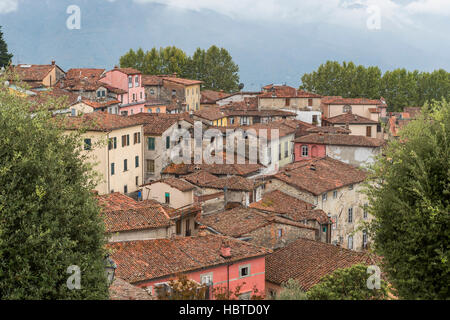 Pania della Croce mountain and the medieval hilltop town of Barga from the terrace of Collegiate Church of San Cristoforo, Barga in Tuscany, Italy. Stock Photo