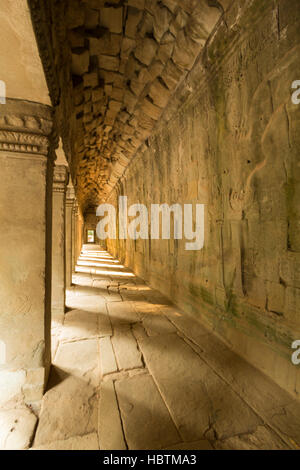 Aisle with columns in the ancient temple of Bayon Temple, Cambodia Stock Photo
