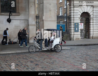 Traditional tourist rickshaw in Covent Garden London Stock Photo