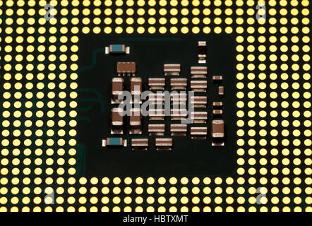 Electronic collection - Modern CPU from the bottom side isolated on white background Stock Photo