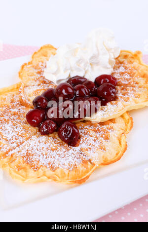 waffles with cherries and cream Stock Photo