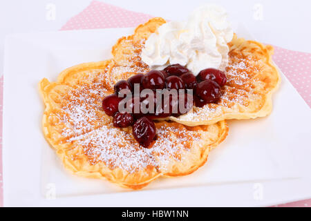 waffles with cherries and cream Stock Photo