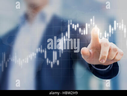 Financial graph showing increase of price in stock market, abstract concept about finance, business person touching chart Stock Photo