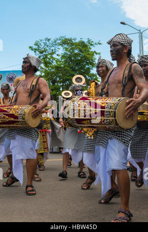 Balinese musicians playing traditional music during Hindu ceremony ...