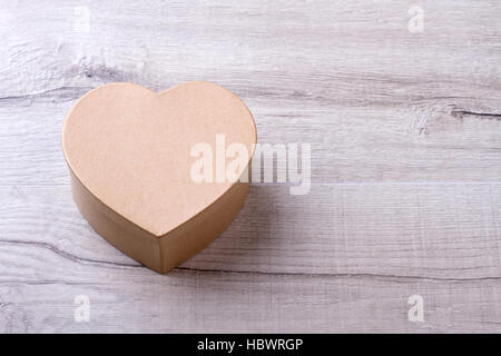 Heart shaped cardboard gift box. Stock Photo