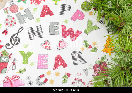 Decoupage New Year decorations made of paper on a plate Stock Photo