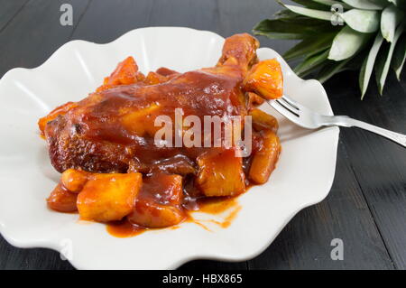 pineapple chicken thigs with barbeque and chilli sauce Stock Photo