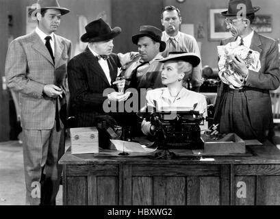 I COVER BIG TOWN, from left, Hillary Brooke, Phillip Reed, relaxing on