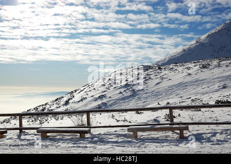 View of sunny mountain slope in High Tatras in ski resort, Slovakia. Stock Photo