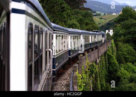 Outside of Transcantabrico Gran Lujo luxury train travellong across northern Spain, Europe. Journey between Candás and Luarca, Asturias, Spain. Stock Photo