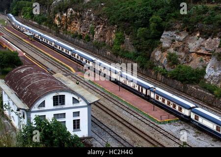 Outside of Transcantabrico Gran Lujo luxury train travellong across northern Spain, Europe. Stoped at Luarca station, Asturias, Spain. Stock Photo