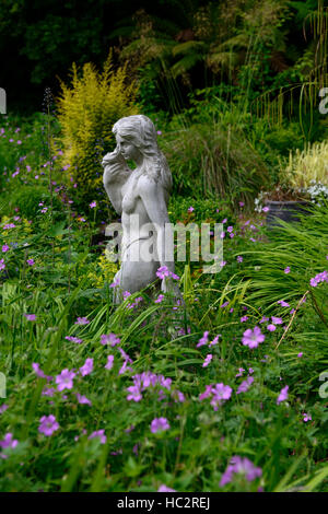 garden design center centered around statue goddess mythology mythological feature gardening green leaves foliage RM Floral Stock Photo