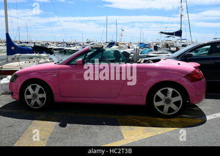 Pink Audi TT Roadster open top soft top convertible car auto puerto banus spain gay icon iconic symbol touring tourister Stock Photo