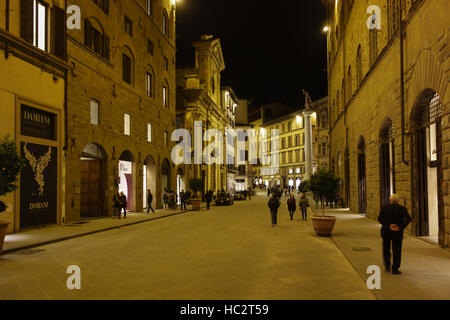 Via de' Tornabuoni, and Piazza de Santa Trinita at night, Florence, Tuscany, Italy Stock Photo
