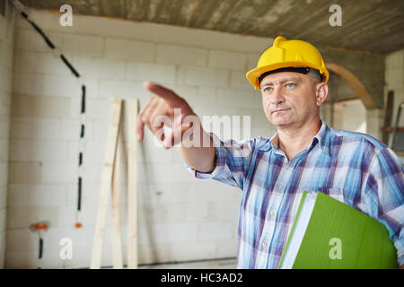 Worker stands in his workshop Stock Photo
