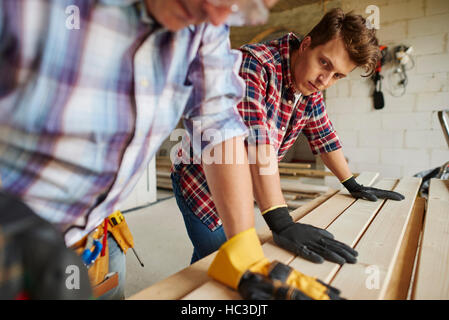 Carpenters are thinking about something new Stock Photo