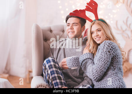 Delighted nice couple having fun together Stock Photo