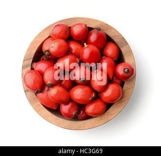 Top view of rose hips in bowl isolated on white Stock Photo