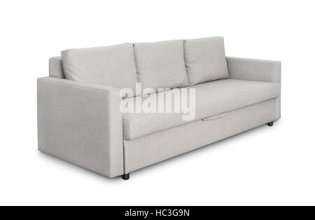 Three seats cozy grey sofa isolated on white Stock Photo