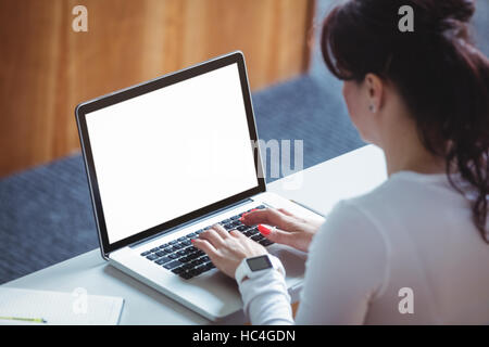 Mature student using laptop Stock Photo