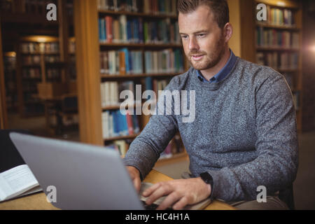 Mature student using laptop Stock Photo