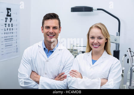 Optometrists standing in ophthalmology clinic Stock Photo