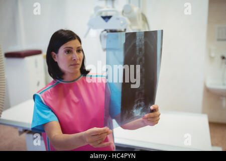 Female doctor examining x-ray Stock Photo