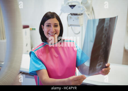 Female doctor examining x-ray Stock Photo