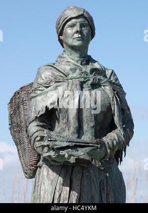 Statue of a Nairn fishwife in the harbour at Nairn, Moray Firth, Highland, Scotland, UK. Stock Photo