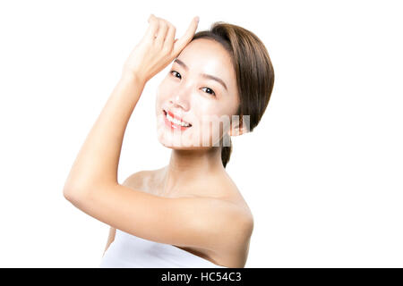 Side view portrait of young smiling woman in tube top posing Stock Photo