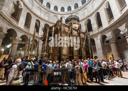 JERUSALEM, ISRAEL - April 06, 2016: Pilgrims and tourists are waiting  to enter Aedicule in Church of the Holy Sepulchre, the world greatest Christian Stock Photo