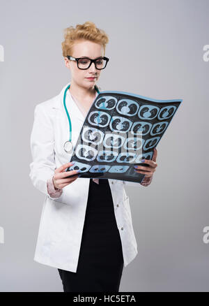 Doctor looking at x ray image Stock Photo