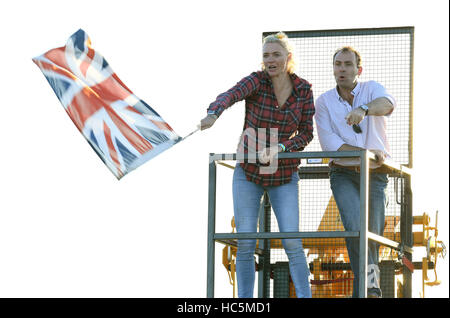 Jodie Kidd fashion model, racing car driver and television personality at the British Lawn Mower Racing Association 12 Hour lawn mower race in Five Oaks, near Billingshurst in West Sussex, UK.  She is the official race starter who dropped the Union Jack a Stock Photo